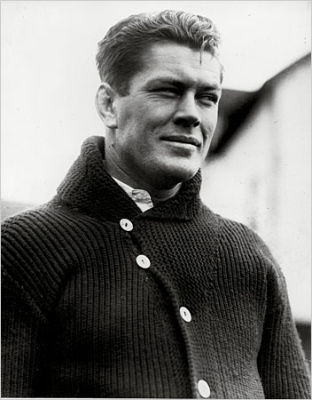 Gene Tunney in shawl-collar cardigan sweater